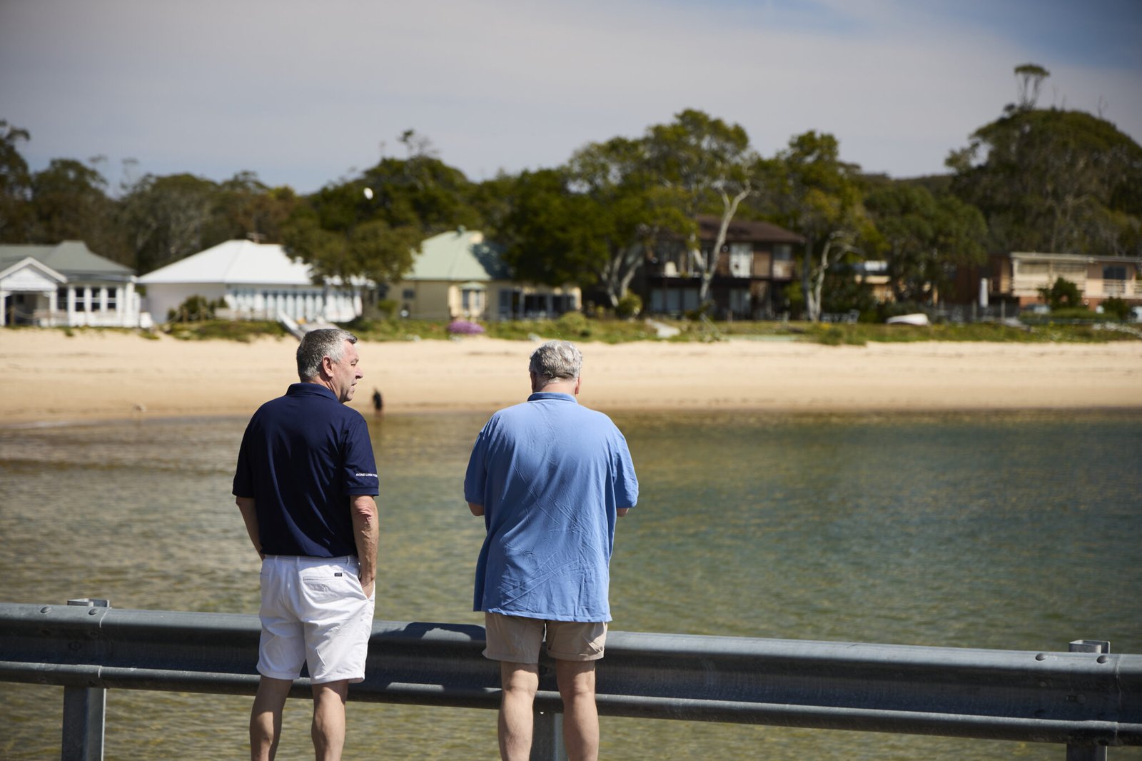 Two people admiring coastal views at Royal National Park lookout