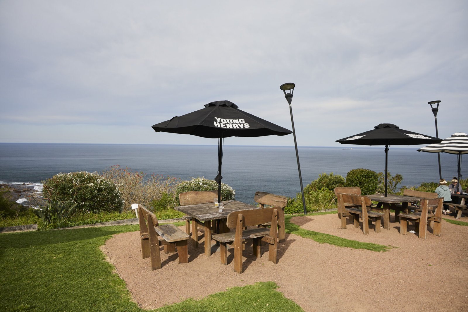 Waves crashing against cliffs at Royal National Park coastline