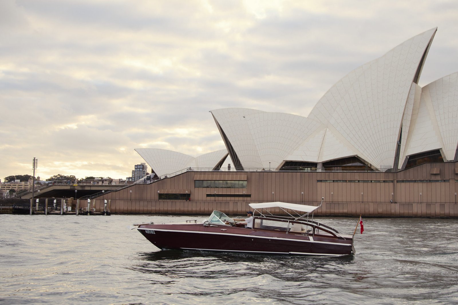 Luxury boat cruise passing the Sydney Opera House on a 1.5 Hour Harbour Sightseeing Cruise