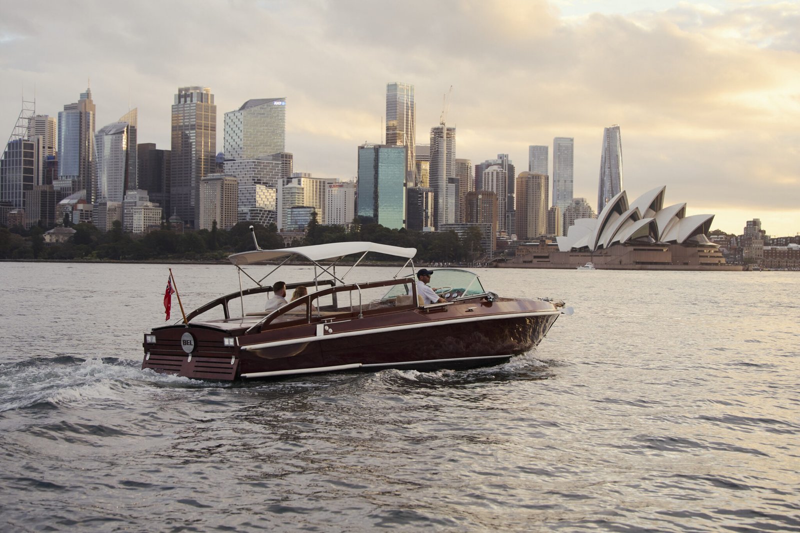 MV Bel at sunset with Sydney skyline in the background